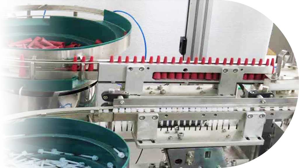 Nail product packaging component feeding and assembly