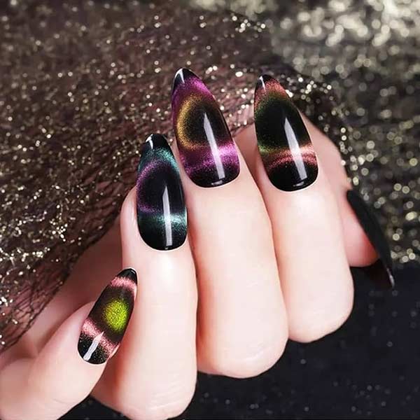 Multi-tone cat eye manicure on hand