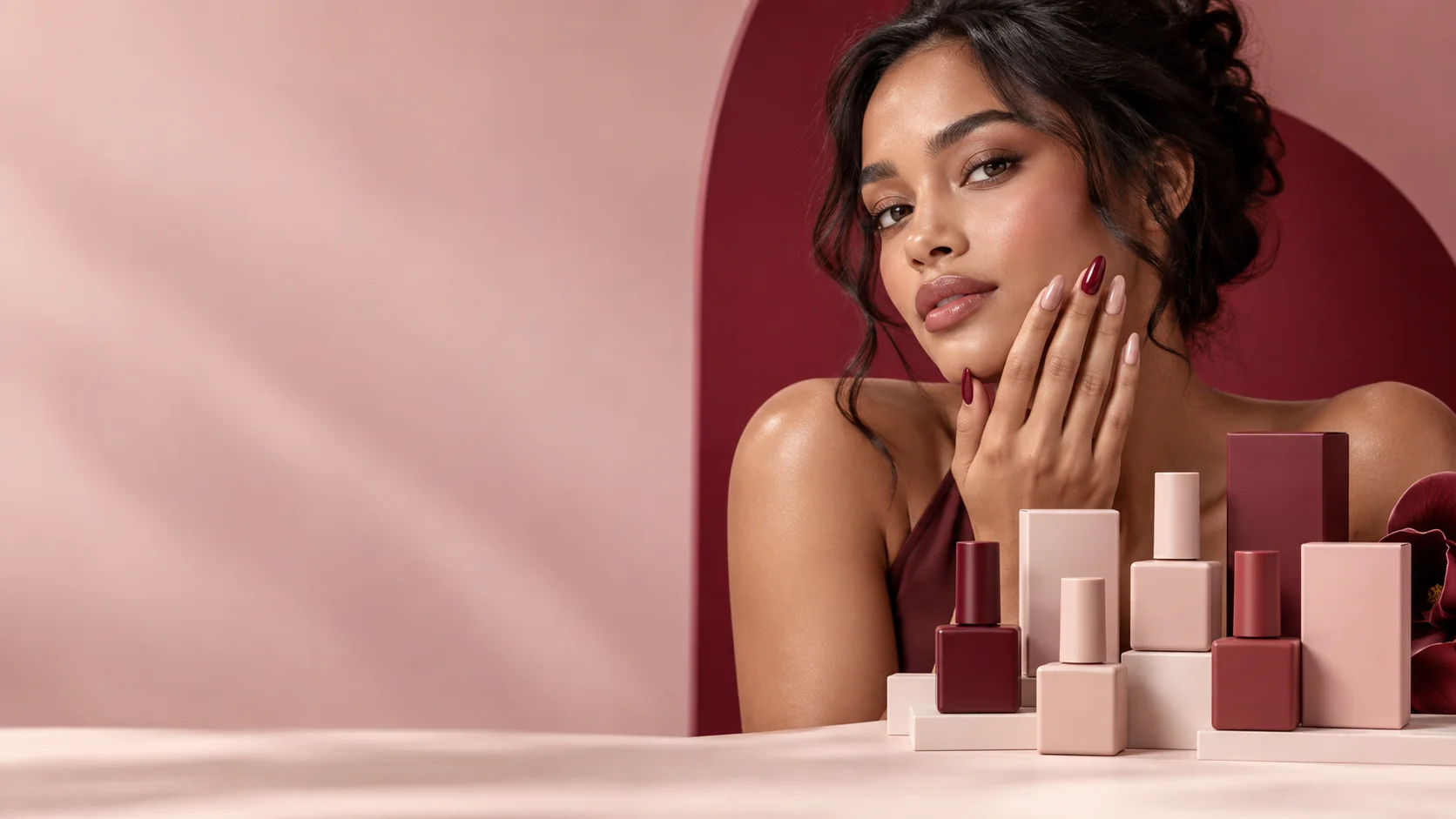Beauty founder with a manicure and opaque private label nail gel packaging