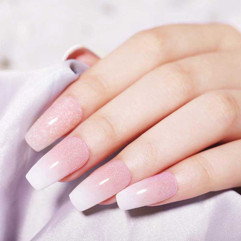 Controlled sparkle nail powder finished effect