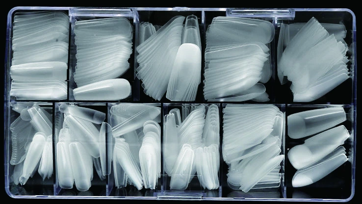 Compartment box containing assorted matte nail tips