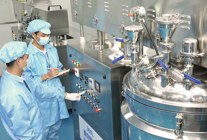 SUSANSAY nail gel production team working with mixing equipment