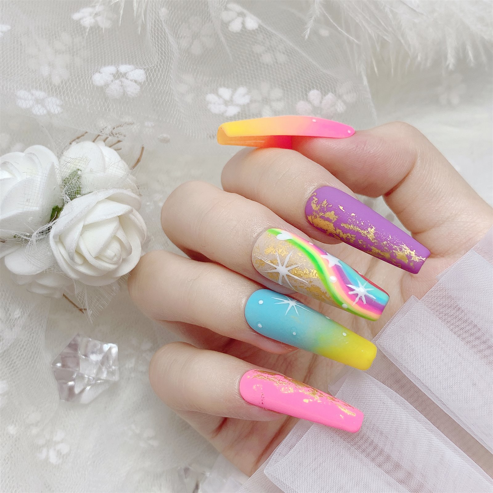 Colorful gradient and hand-painted gel nail trend